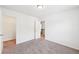 Bedroom featuring a door to the closet and access to upstairs hallway at 2450 Overlook Ave, Lithonia, GA 30058