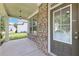 Open front porch view showcasing the home's exterior, window details, and covered entry area at 2450 Overlook Ave, Lithonia, GA 30058