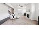 Inviting living room with a fireplace, neutral tones, and easy access to the backyard at 2450 Overlook Ave, Lithonia, GA 30058