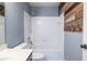 Bathroom featuring white tile, new fixtures, and modern farmhouse accents at 1130 Timbercreek Ct, Alpharetta, GA 30005
