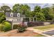 Community pool with a fenced-in area, an open pergola, and lounge chairs for residents at 1130 Timbercreek Ct, Alpharetta, GA 30005