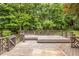 Multi-level wooden deck overlooking a serene, wooded backyard at 1130 Timbercreek Ct, Alpharetta, GA 30005