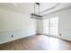 Open dining room featuring large windows that allow for great natural light at 1130 Timbercreek Ct, Alpharetta, GA 30005