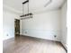 Bright, open dining room features hardwood floors and recessed lighting at 1130 Timbercreek Ct, Alpharetta, GA 30005