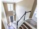 Entryway with wood floors, a grand staircase, a hanging light fixture and front door at 1130 Timbercreek Ct, Alpharetta, GA 30005