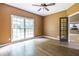 Office with hardwood floors and neutral paint with natural light from the window at 1130 Timbercreek Ct, Alpharetta, GA 30005