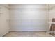 This spacious walk-in closet features white wire shelving and neutral carpet at 1130 Timbercreek Ct, Alpharetta, GA 30005