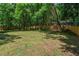 Large, grassy backyard featuring a new wooden fence, perfect for outdoor activities and privacy at 2238 Pinecliff Ne Dr, Atlanta, GA 30345