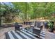 Inviting backyard patio featuring comfortable seating and sleek black accents, perfect for enjoying the outdoors at 2238 Pinecliff Ne Dr, Atlanta, GA 30345