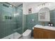 Stylish bathroom featuring a glass-enclosed shower, modern vanity, and attractive tile work at 2238 Pinecliff Ne Dr, Atlanta, GA 30345