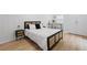 This bedroom offers a calm aesthetic and features a writing desk by the window at 2238 Pinecliff Ne Dr, Atlanta, GA 30345