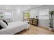 Well-lit bedroom with hardwood floors, sliding glass doors to outside, and ample storage space at 2238 Pinecliff Ne Dr, Atlanta, GA 30345