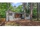 Charming renovated home with painted brick, wood accent wall, and professional landscaping at 2238 Pinecliff Ne Dr, Atlanta, GA 30345
