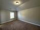 Cozy bedroom with carpet, window and natural light at 3488 Woodshade Dr, Loganville, GA 30052