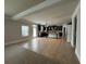 Spacious kitchen featuring dark cabinets, a large island, and a tile backsplash at 3488 Woodshade Dr, Loganville, GA 30052
