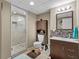 Bathroom featuring a glass shower, stylish vanity, and modern fixtures at 4010 Hamilton Mill Rd, Buford, GA 30519