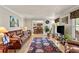 Cozy living room featuring hardwood floors and lots of natural light at 4010 Hamilton Mill Rd, Buford, GA 30519