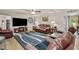 Spacious living area with a large TV and leather furniture at 4010 Hamilton Mill Rd, Buford, GA 30519