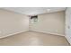 Large room with neutral walls, carpet flooring and a window offering plenty of natural light at 4010 Hamilton Mill Rd, Buford, GA 30519