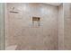 Close-up of tiled shower with a built-in niche, offering a spa-like experience at 4010 Hamilton Mill Rd, Buford, GA 30519
