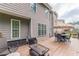 Inviting deck with ample seating and dining space provides a perfect extension of the home at 5342 Lakerock Sw Dr, Atlanta, GA 30331