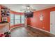 Spacious bedroom with hardwood floors, natural light, and a ceiling fan at 5342 Lakerock Sw Dr, Atlanta, GA 30331