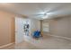 Spacious bedroom with plush carpet and access to a walk-in closet for ample storage at 5342 Lakerock Sw Dr, Atlanta, GA 30331