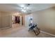 Carpeted bedroom showing entry to walk-in closet and additional room at 5342 Lakerock Sw Dr, Atlanta, GA 30331