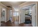 Hallway showcasing hardwood floors and doorways leading to a bedroom, bathroom, and other living spaces at 5342 Lakerock Sw Dr, Atlanta, GA 30331