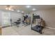 Home gym featuring a treadmill and weightlifting equipment at 5342 Lakerock Sw Dr, Atlanta, GA 30331