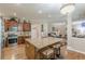Open kitchen with large island, stainless steel appliances, and seating at 5342 Lakerock Sw Dr, Atlanta, GA 30331