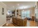 Gourmet kitchen island with seating, open to the living area and natural light at 5342 Lakerock Sw Dr, Atlanta, GA 30331