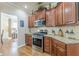 Stylish kitchen with stainless steel appliances, granite countertops, and elegant cabinetry at 5342 Lakerock Sw Dr, Atlanta, GA 30331