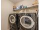 Convenient laundry room featuring a washer and dryer set at 5342 Lakerock Sw Dr, Atlanta, GA 30331