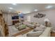 Bright living room with a large sofa and stylish decor at 5342 Lakerock Sw Dr, Atlanta, GA 30331