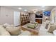 Bright living room with a large sofa and stylish decor at 5342 Lakerock Sw Dr, Atlanta, GA 30331