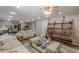 Spacious living room featuring plush sofas and a coffee table at 5342 Lakerock Sw Dr, Atlanta, GA 30331