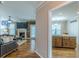 Open concept living area, highlighting seamless transition to kitchen and outdoor access at 5342 Lakerock Sw Dr, Atlanta, GA 30331