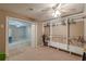 Spacious walk-in closet with custom built-in shelving and racks for optimal organization and storage at 5342 Lakerock Sw Dr, Atlanta, GA 30331