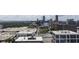 A dynamic aerial view of the city's skyline, capturing the urban landscape with a mix of buildings and greenery at 3475 Oak Valley Rd # 1850, Atlanta, GA 30326