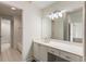 The bathroom features a long white vanity with drawers and an open door to the shower at 3475 Oak Valley Rd # 1850, Atlanta, GA 30326