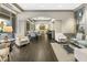Clubhouse lounge area with stylish seating, hardwood floors, and abundant natural light at 3475 Oak Valley Rd # 1850, Atlanta, GA 30326