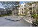 Charming courtyard with a central gazebo, manicured hedges, and a serene atmosphere at 3475 Oak Valley Rd # 1850, Atlanta, GA 30326