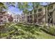 Picturesque courtyard featuring lush green lawn, mature trees, and meticulously maintained landscaping at 3475 Oak Valley Rd # 1850, Atlanta, GA 30326