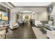 Bright living area featuring hardwood floors, comfortable seating, and a large window at 3475 Oak Valley Rd # 1850, Atlanta, GA 30326