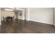 Open-concept living and dining area with hardwood floors and ample space at 3475 Oak Valley Rd # 1850, Atlanta, GA 30326