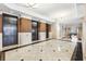 Elegant lobby with black and white tile floors, wood paneled walls, and three elevators at 3475 Oak Valley Rd # 1850, Atlanta, GA 30326
