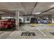 A view of a parking garage with reserved spots and several cars at 3475 Oak Valley Rd # 1850, Atlanta, GA 30326