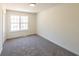 This bedroom features a window, new floors and neutral paint at 2192 Stenger Rd, Douglasville, GA 30135