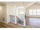 This home's entryway features high ceilings and new flooring at 2192 Stenger Rd, Douglasville, GA 30135